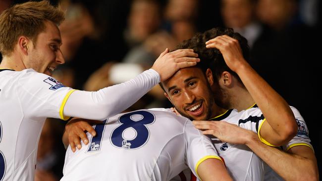 Andros Townsend of Spurs (2R) celebrates with team mates.