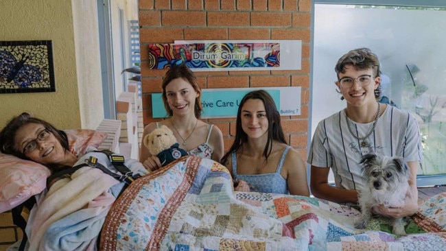 Alison Gray in hospital with her children Eden, Jess and Josh Gray. Picture – supplied.