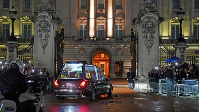 The Royal Hearse carrying the coffin of Queen Elizabeth II arrives at Buckingham Palace on Tuesday evening. Picture: Getty Images