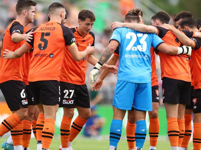 BRISBANE, AUSTRALIA - JANUARY 14: Roar huddle during the round 12 A-League Men's match between Brisbane Roar and Wellington Phoenix at Moreton Daily Stadium, on January 14, 2023, in Brisbane, Australia. (Photo by Chris Hyde/Getty Images)