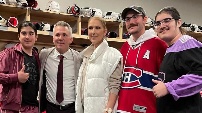 Celine took her three sons to the game.