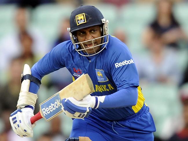 20/06/2009 WIRE: Sri Lanka's Sanath Jayasuriya scores a run against The West Indies during the ICC World Twenty20 semi-final match at the Oval in London June 19, 2009. AFP PHOTO / Adrian Dennis