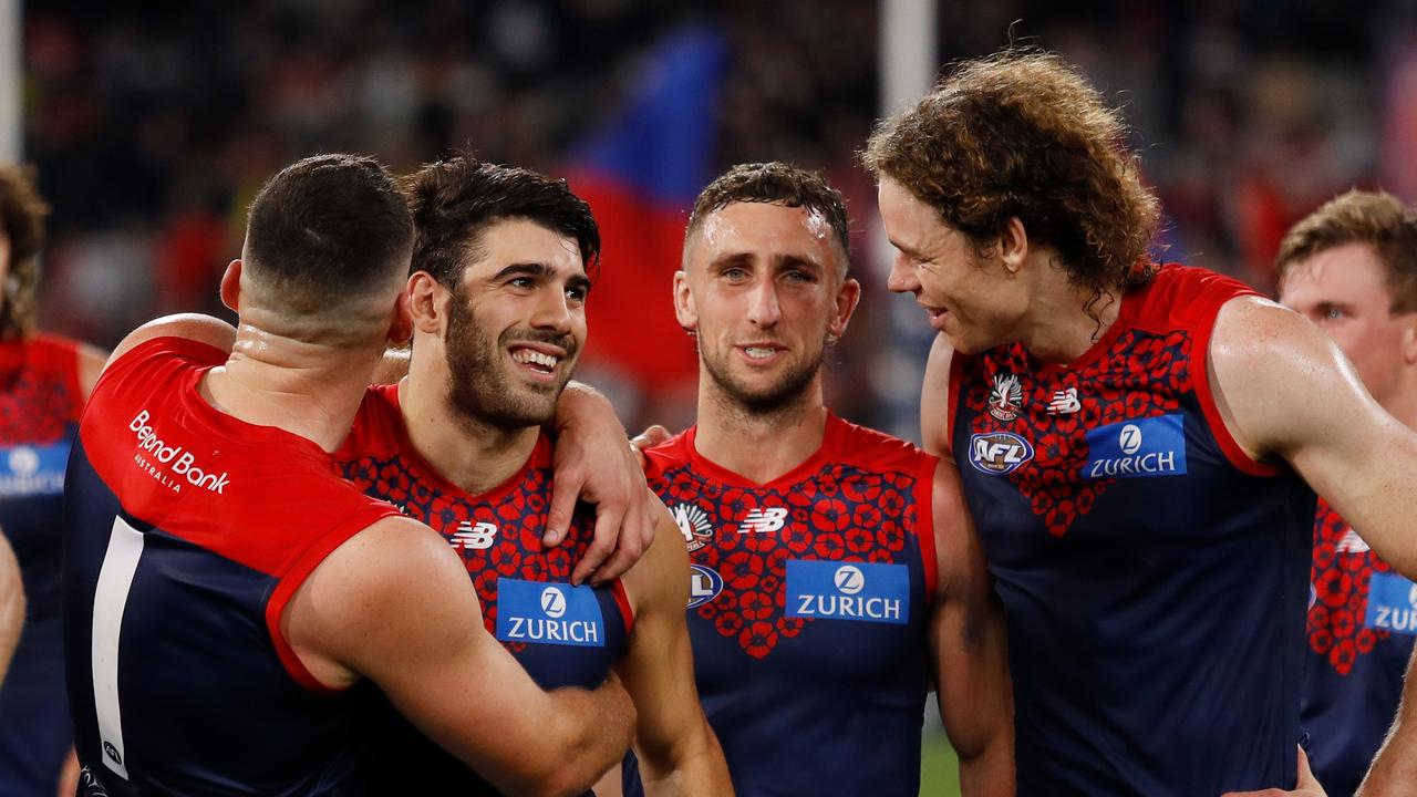 MELBOURNE, AUSTRALIA - APRIL 24: Steven May of the Demons celebrates with Christian Petracca of the Demons during the 2022 AFL Round 06 match between the Richmond Tigers and the Melbourne Demons at the Melbourne Cricket Ground on April 24, 2022 in Melbourne, Australia. (Photo by Dylan Burns/AFL Photos via Getty Images)