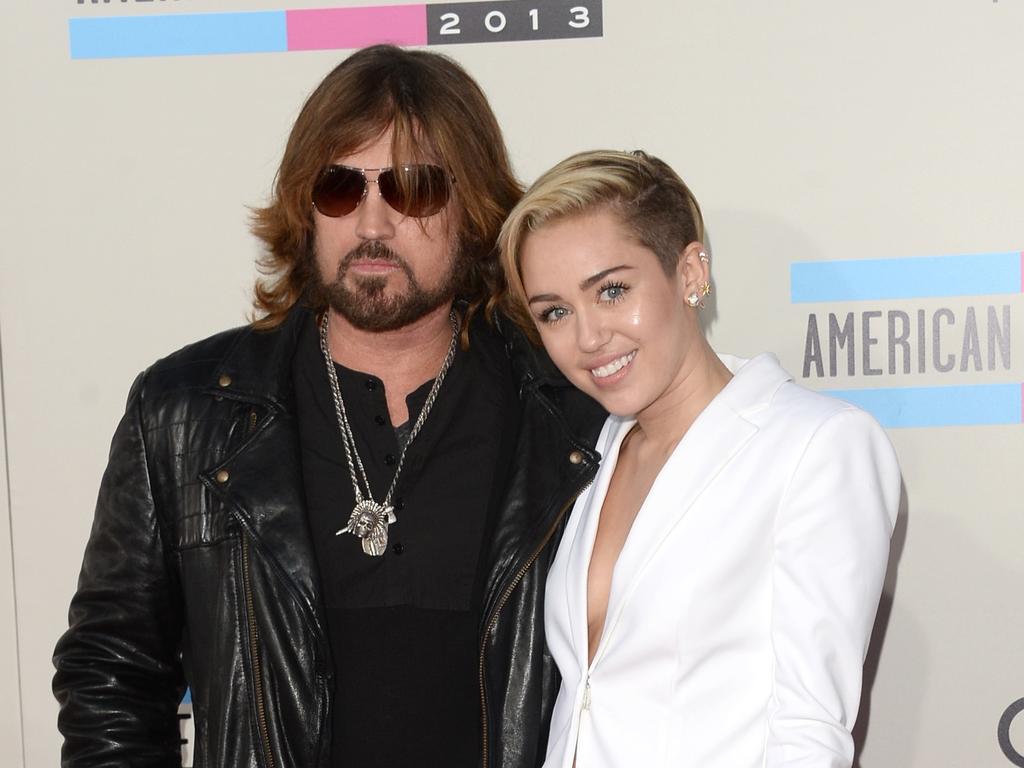 Billy Ray Cyrus with superstar daughter Miley Cyrus in 2013. The pair are said to no longer be on speaking terms. Picture: Getty Images