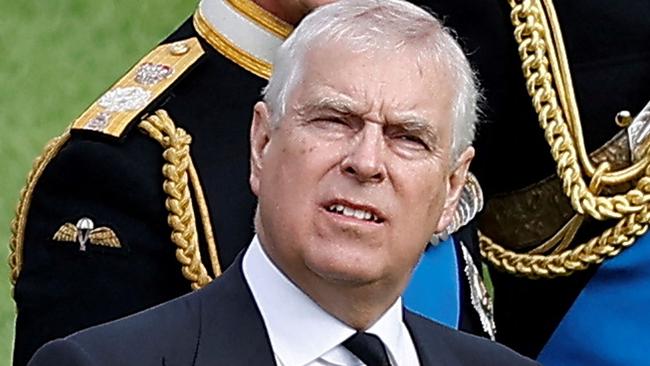 Britain's Prince Andrew, Duke of York (L), Britain's King Charles III (C) and Britain's Prince Edward, Earl of Wessex react ahead of the Committal Service for Britain's Queen Elizabeth II in St George's Chapel inside Windsor Castle on September 19, 2022. - Monday's committal service is expected to be attended by at least 800 people, most of whom will not have been at the earlier State Funeral at Westminster Abbey. (Photo by PETER NICHOLLS / POOL / AFP)