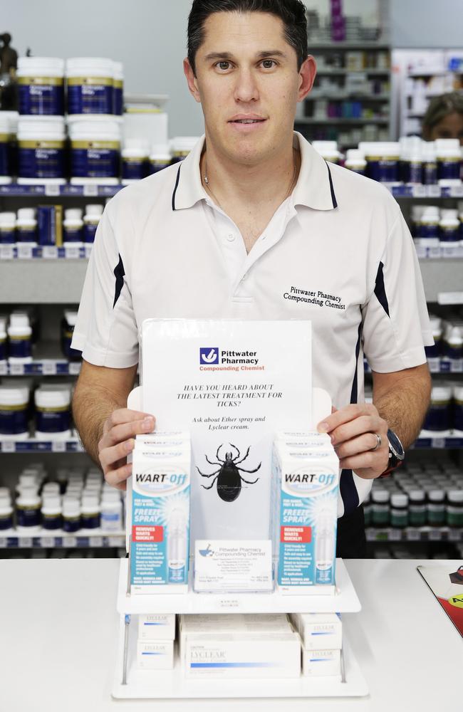 Pittwater Pharmacy Pharmacist Andrew Snow with the 'Wart-Off' pen which is a modern tool against ticks. Picture: Braden Fastier