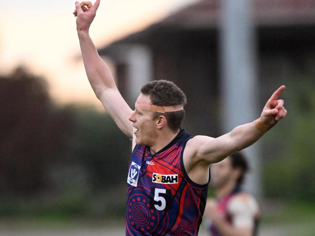 MELBOURNE, AUSTRALIA - JULY 03: Ryan Exon of the Lions reacts after almost kicking a goal during the round 15 VFL match between Coburg Lions and the Gold Coast Suns at Piranha Park on July 03, 2022 in Melbourne, Australia. (Photo by Morgan Hancock/AFL Photos/via Getty Images)