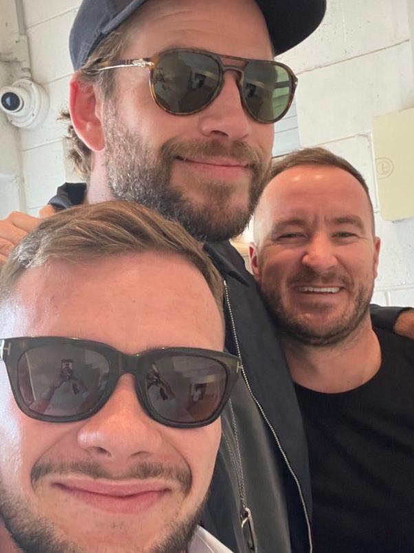 Rhys Gordon (left) with Liam Hemsworth (centre) and Gold Coast real estate agency director Jesse Willcox at Rick Shores on the Gold Coast on Friday.