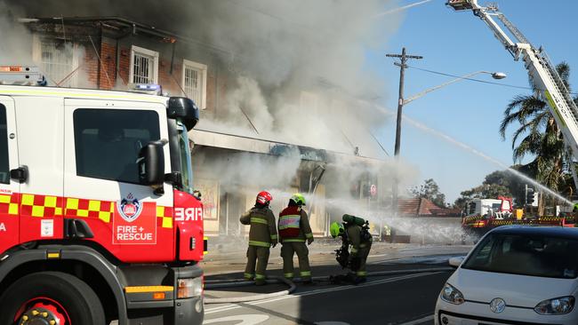 Firefighters were confronted with large volumes of smoke and fire. Picture: Richard Dobson