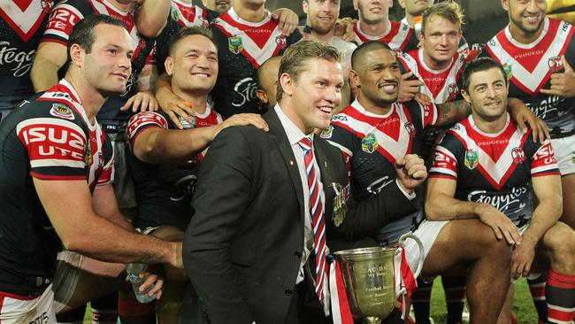 Roosters fan Thomlinson celebrating with the Roosters in 2014.