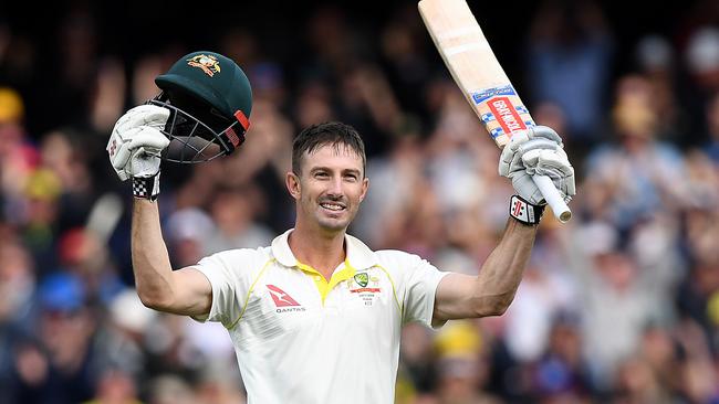 Shaun Marsh celebrates his century on Day 2 in Adelaide.