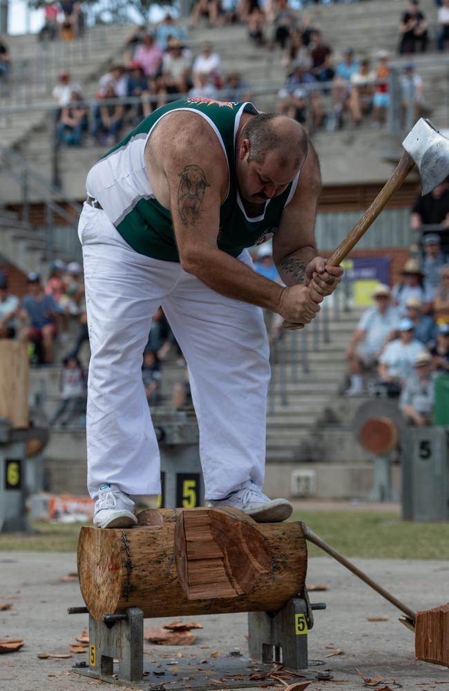 Stephen Foster chopping wood at the Woodchop Stadium at the Royal Easter Show in 2019. Picture: AAP