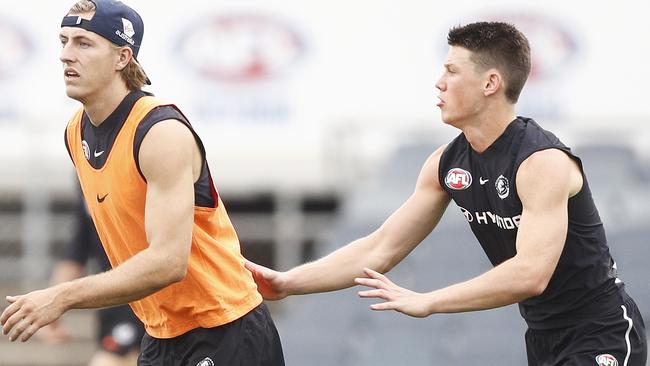 Will Setterfield and Sam Walsh at Carlton training. The No.1 pick managed 123 SuperCoach points against the Suns. Picture: Daniel Pockett/Getty Images