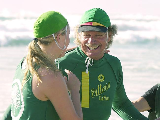 Midget Farrelly with one of the Palm Beach surf boat crew, in which he was sweep, after qualifying for the Women’s Open Boat gold medal final at Kurrawa, on the Gold Coast, in 2001. Picture: Joe Murphy