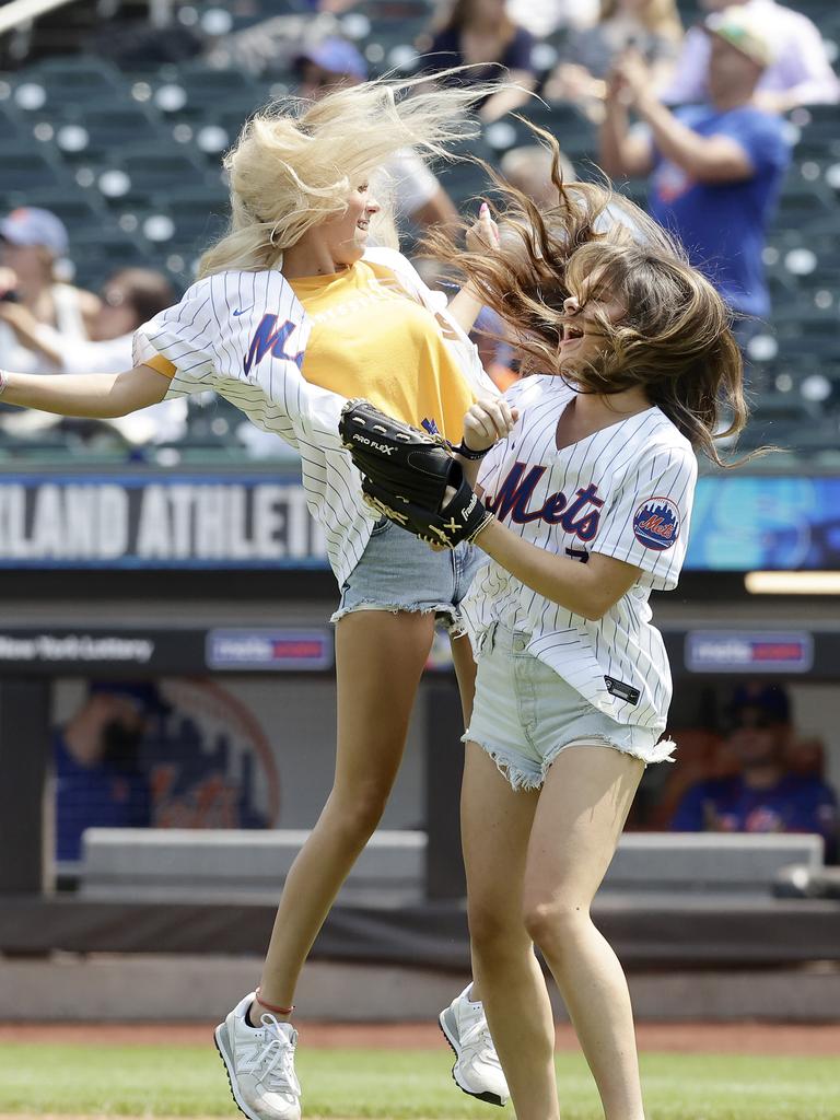 She also chest bumped with a friend. Photo by Jim McIsaac/Getty Images