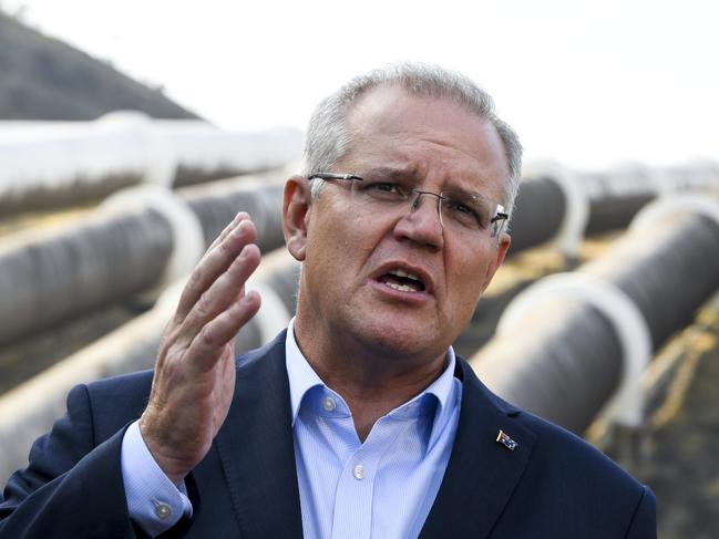 Australian Prime Minister Scott Morrison speaks to the media after a tour of the Tumut 3 power station at the Snowy Hydro Scheme in Talbingo, Tuesday, February 26, 2019. Scott Morrison announced today a further $1.3 billion investment into the Snowy Hydro 2.0 project. (AAP Image/Lukas Coch) NO ARCHIVING