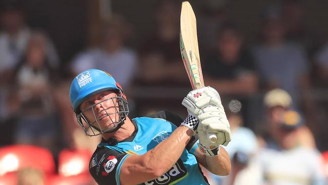 Chris Lynn launches another huge shot playing with the Brisbane Heat.