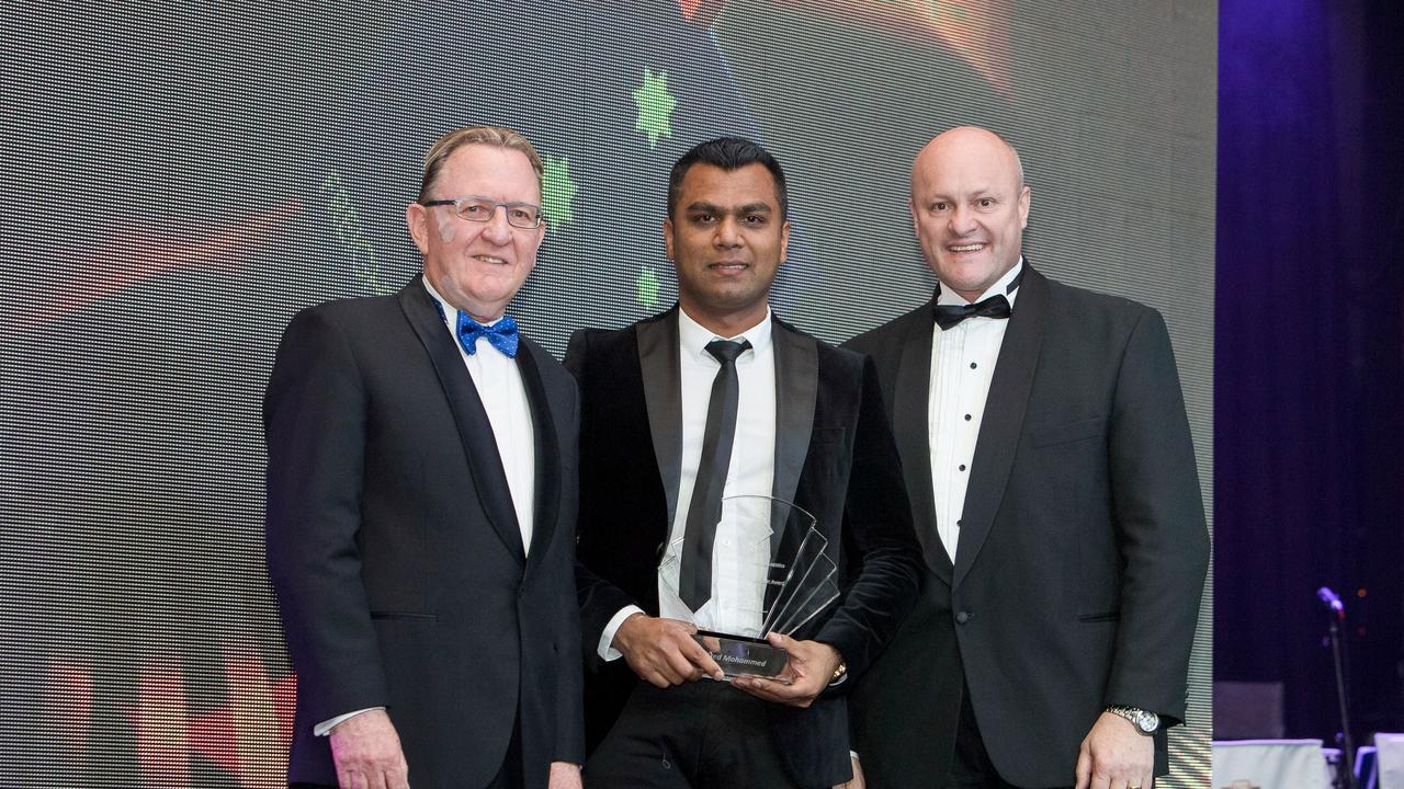 Mohammed (centre) won the 2014 Australian Transport and Logistics Young Achiever of the Year.