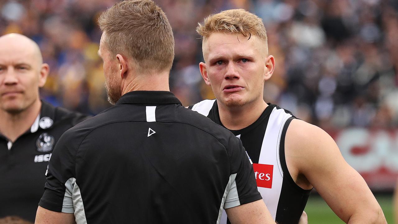 Adam Treloar and Nathan Buckley in the moments after the 2018 Grand Final. Picture: Phil Hillyard