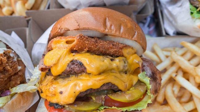 A Brisbane fast-food operator has just registered the name “In-N-Out Aussie Burgers,’’ triggering a potential trademark battle.