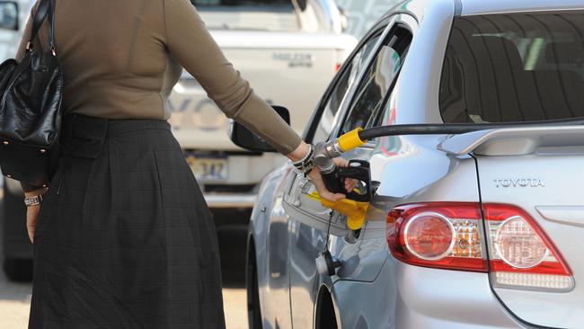 Perth Now Pictured is the new Puma Super 7 Service Station , Guildford Road Bayswater . Pictured is the action during the free fuel giveaway at Puma Super 7 Service Station . Generic fuel / petrol / service station / pump