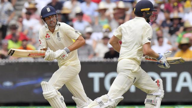 England's Alastair Cook, left, and Chris Woakes. Picture: AP.