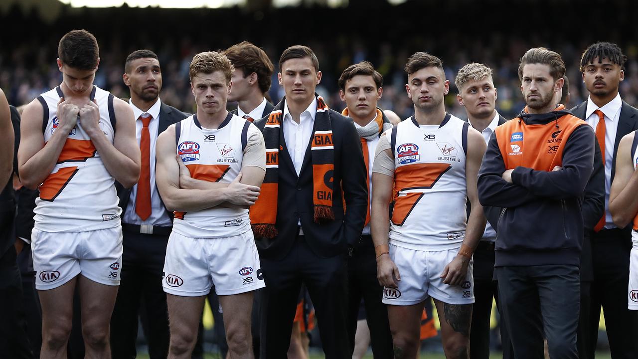 MELBOURNE, AUSTRALIA - SEPTEMBER 28: The Giants look dejected after during the 2019 AFL Grand Final match between the Richmond Tigers and the Greater Western Sydney Giants at Melbourne Cricket Ground on September 28, 2019 in Melbourne, Australia. (Photo by Ryan Pierse/AFL Media/via Getty Images )