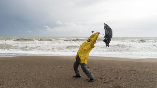 Man on stormy beach. File image.