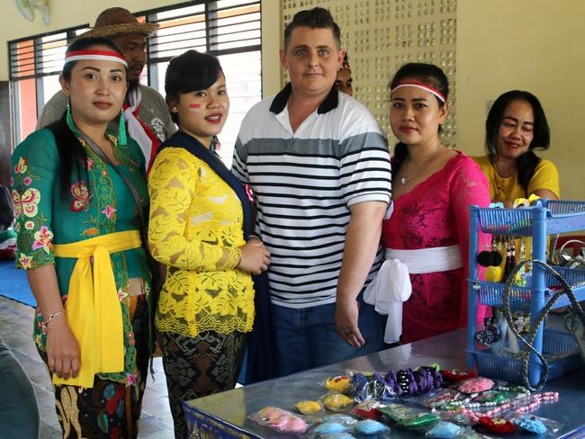 Bali Nine member Renae Lawrence poses with  inmates and jail staff  inside Bangli Jail. Picture:  Lukman  Bintoro