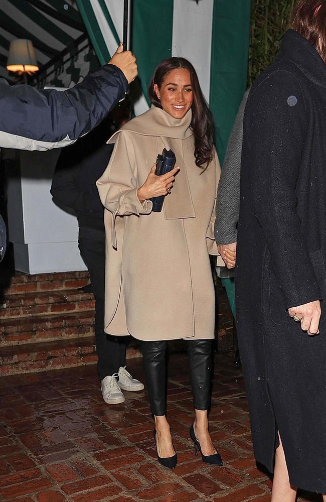 The Duchess of Sussex smiles during her first major public outing in months. Picture: The Daily Stardust / ShotbyNYP/MEGA / BACKGRID