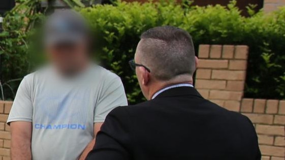 Darren Kennedy (in grey shirt), dubbed the “Inner West rapist”, was arrested in 2021.