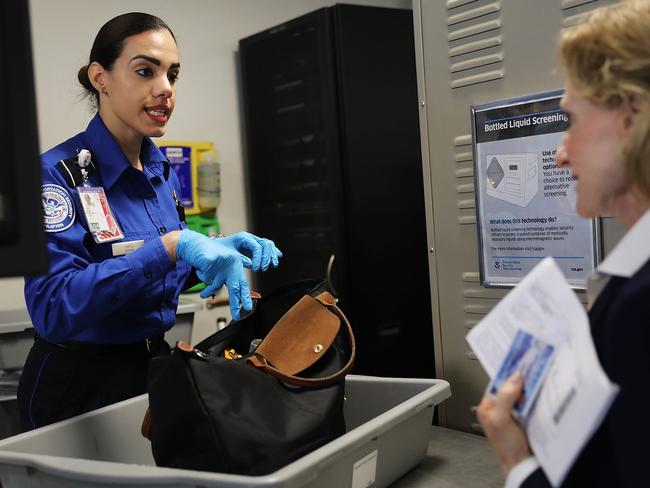 Unlike the aviation industry, there is no governing body to implement an industry standard when it comes to security for accommodation providers. Picture: Spencer Platt/Getty Images/AFP