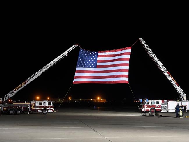 A large US flag is set up ahead of the arrival of US detainees Kim Hak-song, Tony Kim and Kim Dong-chul. Picture: AFP/Saul Loeb