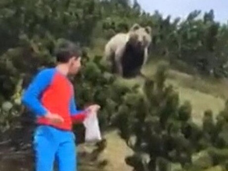 Chilling video of boy stalked by giant bear