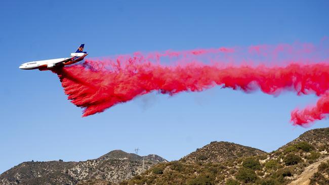 An air tanker drops retardant while working to contain the Eaton Fire in Altadena, California. Picture: AP