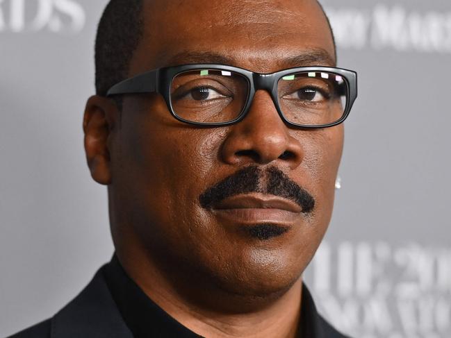(FILES) In this file photo taken on November 6, 2019 US actor Eddie Murphy attends the WSJ Magazine 2019 Innovator Awards at MOMA in New York City. - The Golden Globes -- long known as Hollywood's favorite party, but rocked by recent scandals -- will attempt to stage a celebrity-filled comeback Tuesday, as films from Steven Spielberg's 