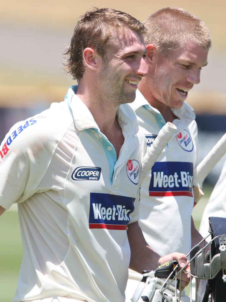 Phil Hughes and David Warner during a Sheffield Shield match for NSW.