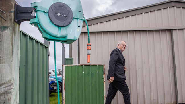 Mr Morrison visits Beauty Point Bowls club to meet with community members, play lawn bowls and announce that the club will be receiving $180,000 in funding for facility upgrades. Picture: Jason Edwards