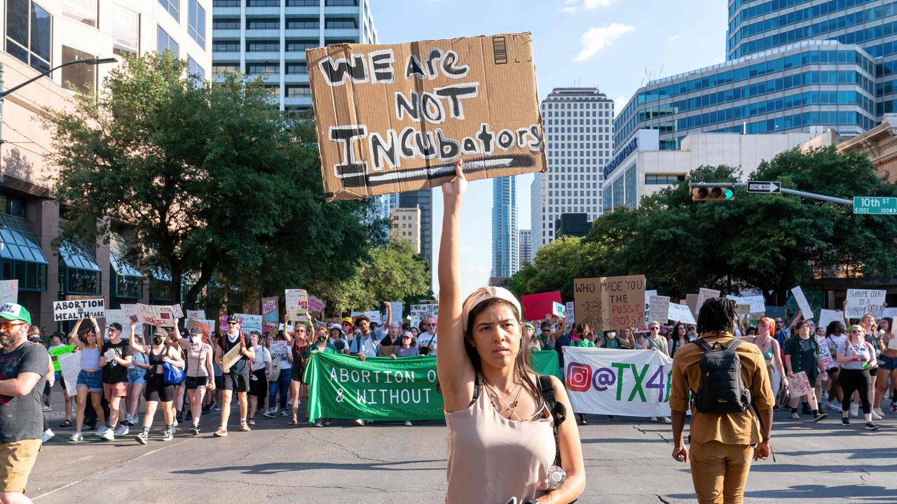 Abortion rights demonstrators gather. Picture: Suzanne Cordeiro/AFP