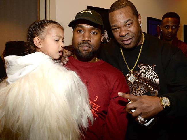 North West, Kanye West and Busta Rhymes. Picture: Getty Images
