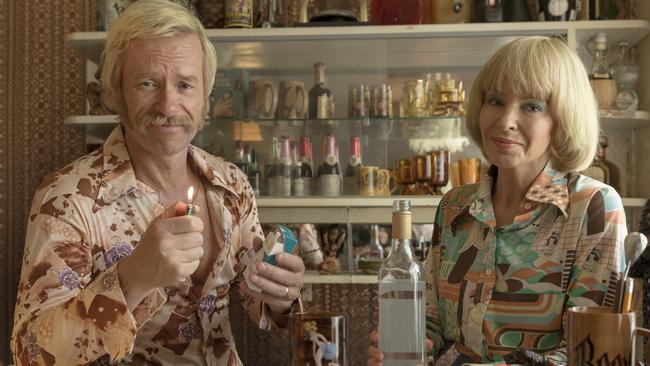 Kylie Minogue and Guy Pearce in the first official shots from the movie Flammable Children, due to be released at the end of the year. The movie is loosely based on life in 1970s Dee Why, where behind closed doors, the mums and dads of a quiet suburban cul-de-sac are joining the sexual revolution and throwing a wife-swapping key party.