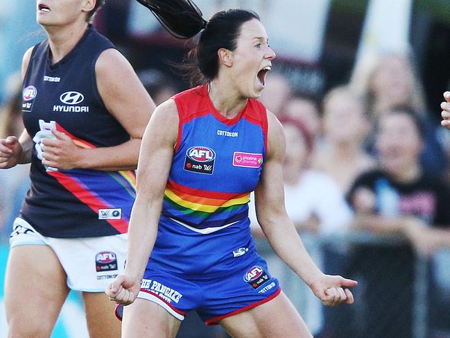 MELBOURNE, AUSTRALIA - FEBRUARY 23:  Brooke Lochland of the Bulldogs celebrates a goal during the round four AFLW match between the Western Bulldogs and the Carlton Blues at Whitten Oval on February 23, 2018 in Melbourne, Australia.  (Photo by Michael Dodge/Getty Images)