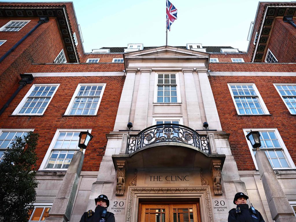 Police officers stand guard outside the London Clinic, where Princess Catherine has been staying for the past week. Picture: AFP