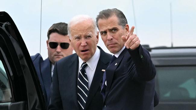 US President Joe Biden talks with his son Hunter Biden. Picture: AFP