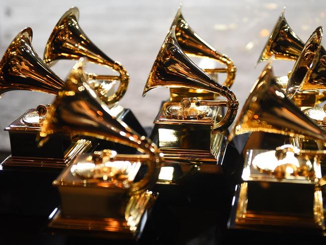 (FILES) In this file photo taken on January 28, 2018 Grammy trophies sit in the press room during the 60th Annual Grammy Awards in New York. - The organization behind the Grammys on January 5, 2022 postponed the music awards gala scheduled for January 31 due to "uncertainty surrounding the Omicron variant" that's ripped through the United States in recent weeks. (Photo by Don EMMERT / AFP)