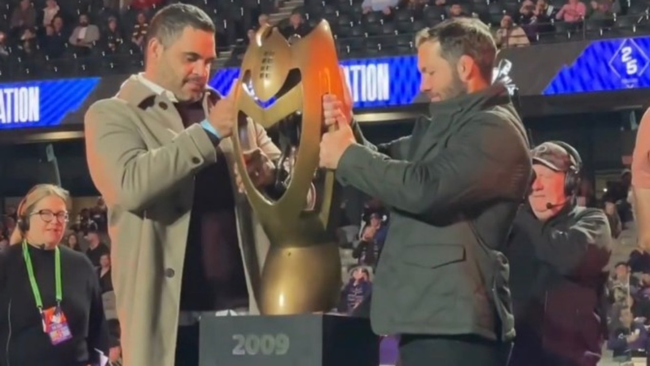 The Melbourne Storm show off their 2009 premiership trophy. Photo: NRLRoast