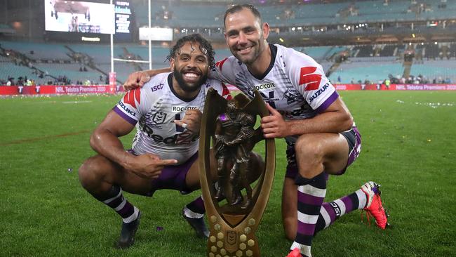 Storm winger Josh Addo-Carr and skipper Cameron Smith pose with the trophy Picture: Getty Images