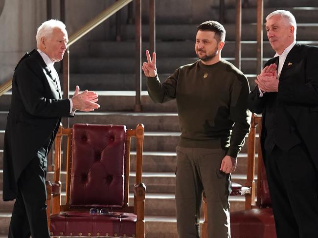 Ukrainian President, Volodymyr Zelensky is applauded by Speaker of the House of Lords, Lord McFall, (L) and Speaker of the House of Commons, Sir Lindsay Hoyle. Picture: Getty