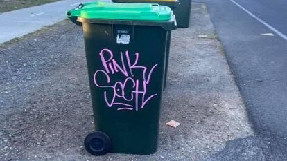 Some of the tags left around Byron Bay by the group.​