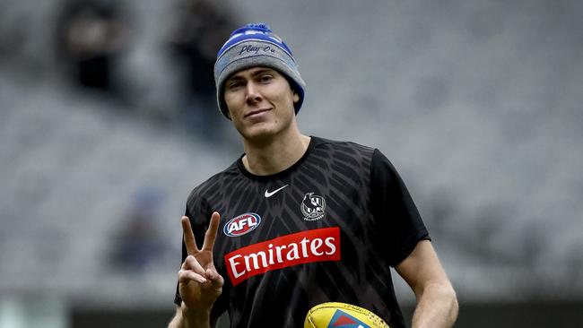 MELBOURNE, AUSTRALIA – JULY 04: Mason Cox of the Magpies warms up before the round 16 AFL match between Collingwood Magpies and St Kilda Saints at Melbourne Cricket Ground on July 04, 2021 in Melbourne, Australia. (Photo by Darrian Traynor/Getty Images)